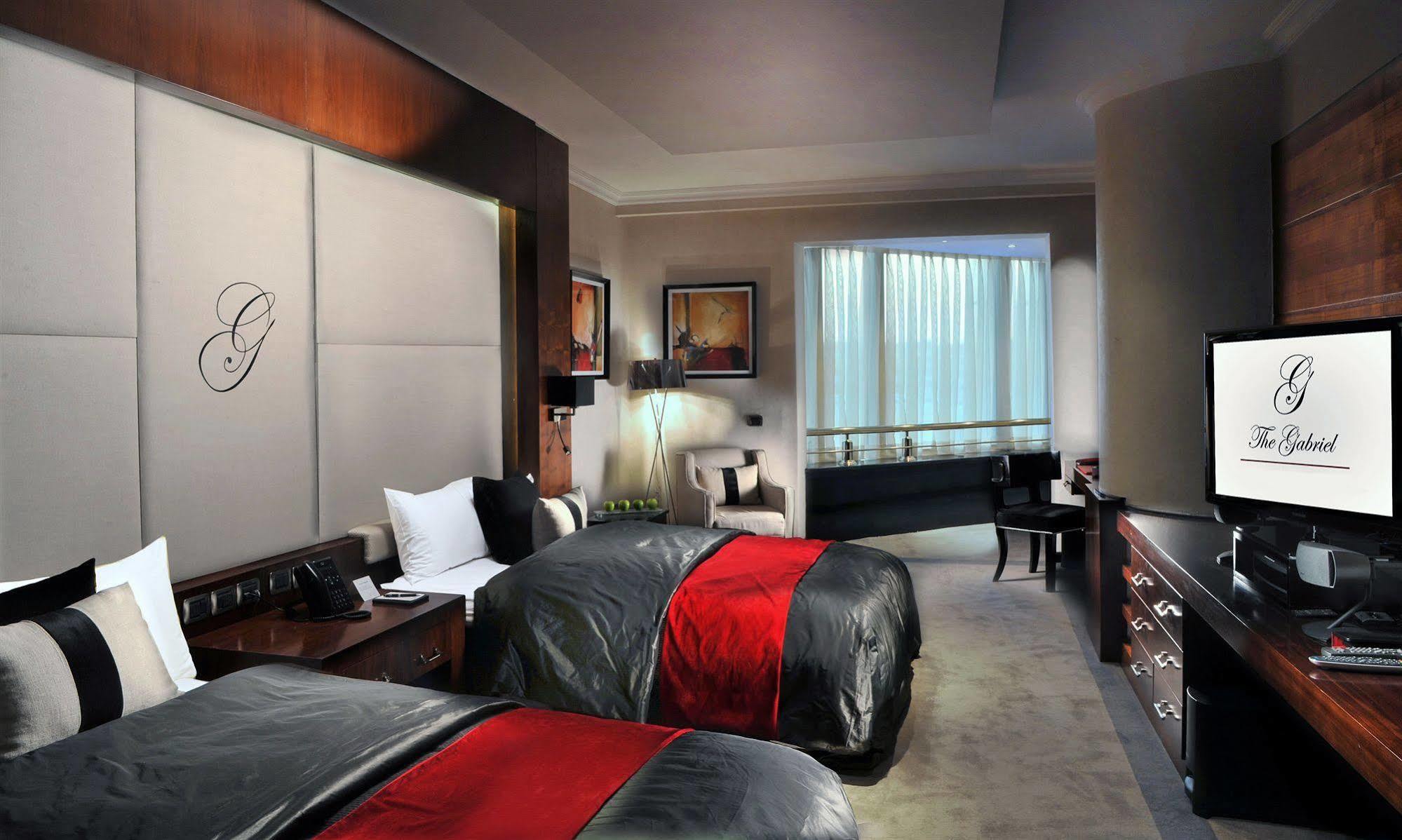 Sun City Hotel - The Gabriel Каир Экстерьер фото A room at the G Tower
